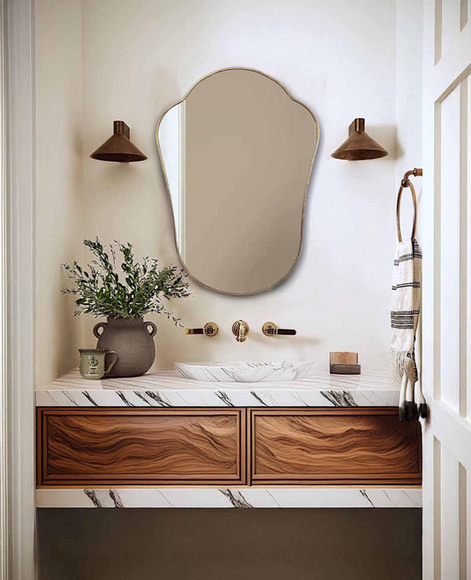 brass mirror in powder room