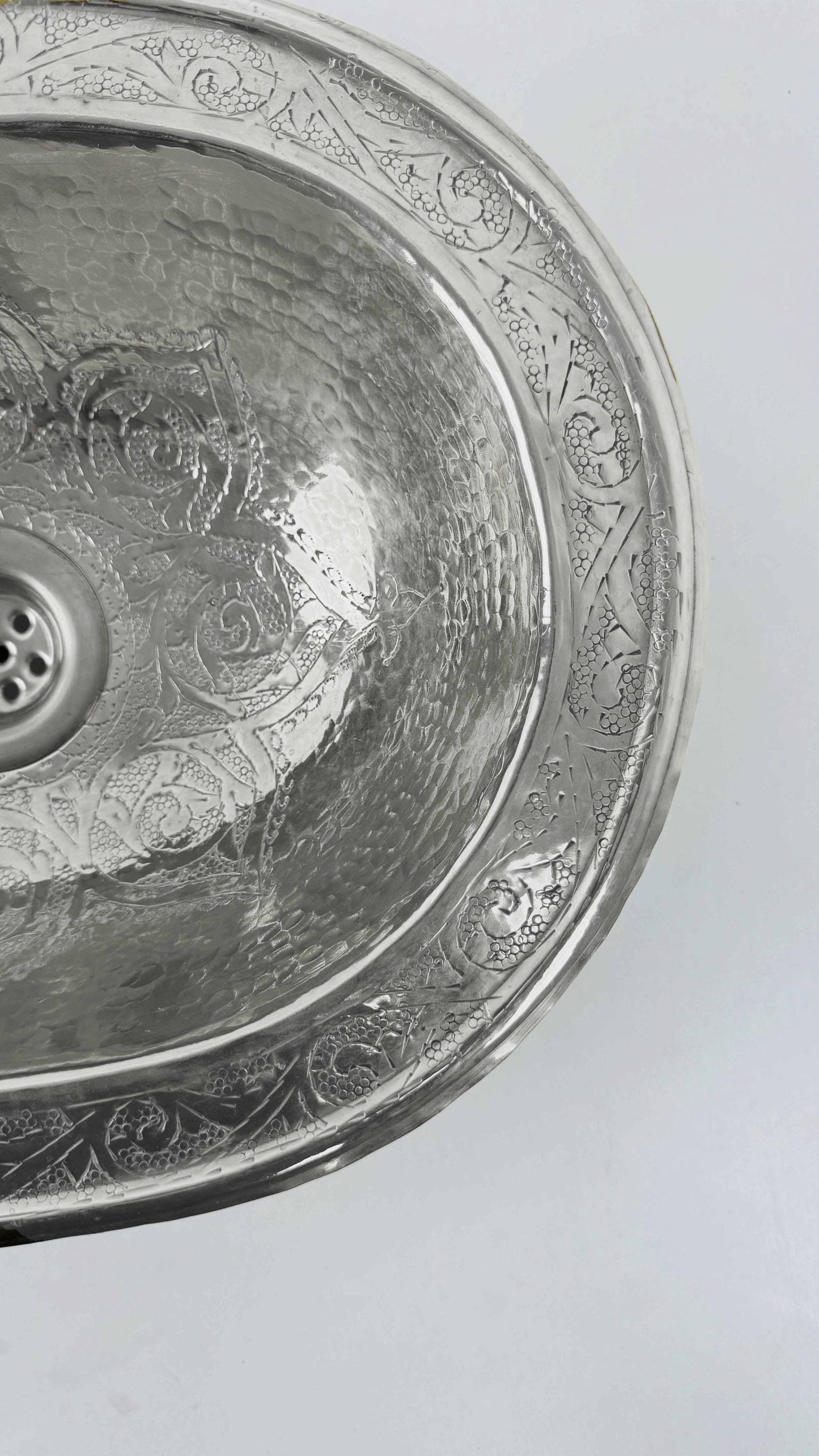 silver engraved sink