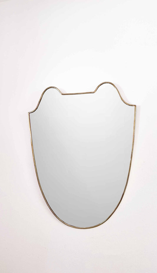 unlacquered brass mirror