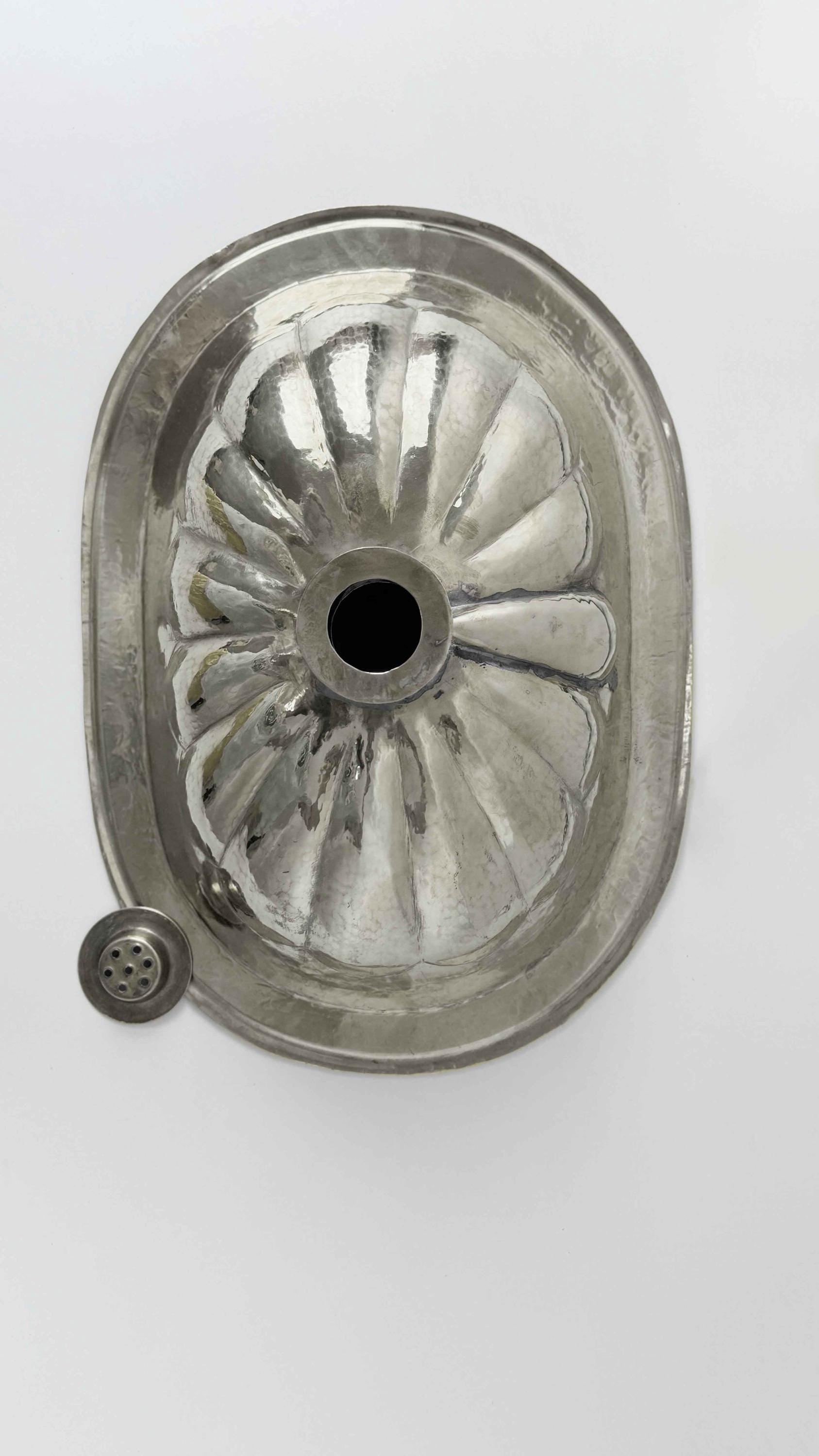 back of Oval Silver Bathroom Sink