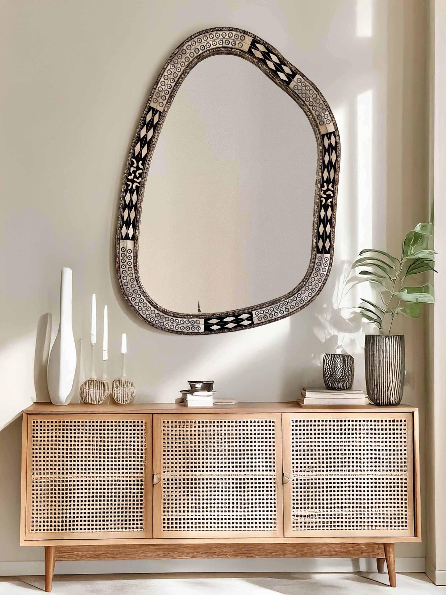 Asymmetrical Mirror above living room dresser