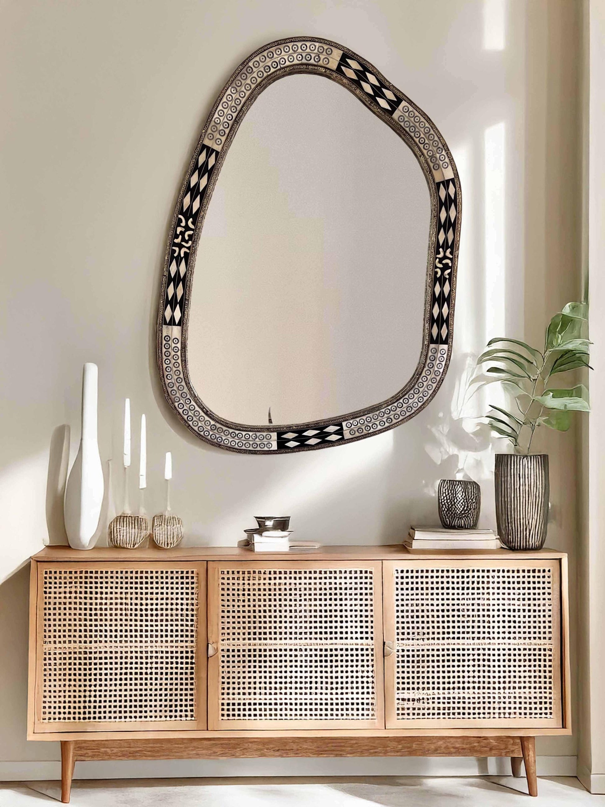 Asymmetrical Mirror above living room dresser