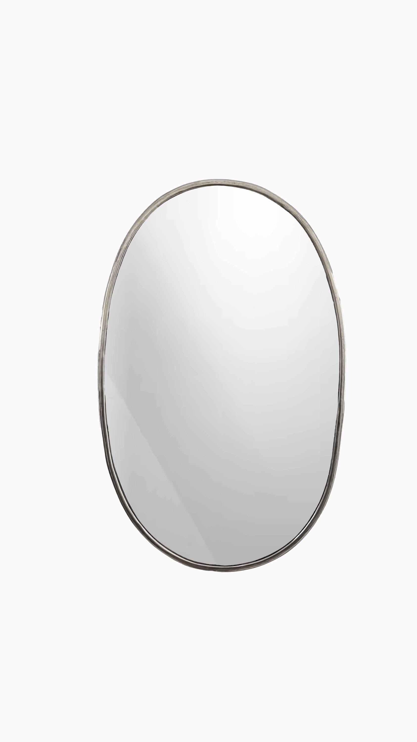 silver oval mirror