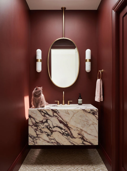 oval brass mirror