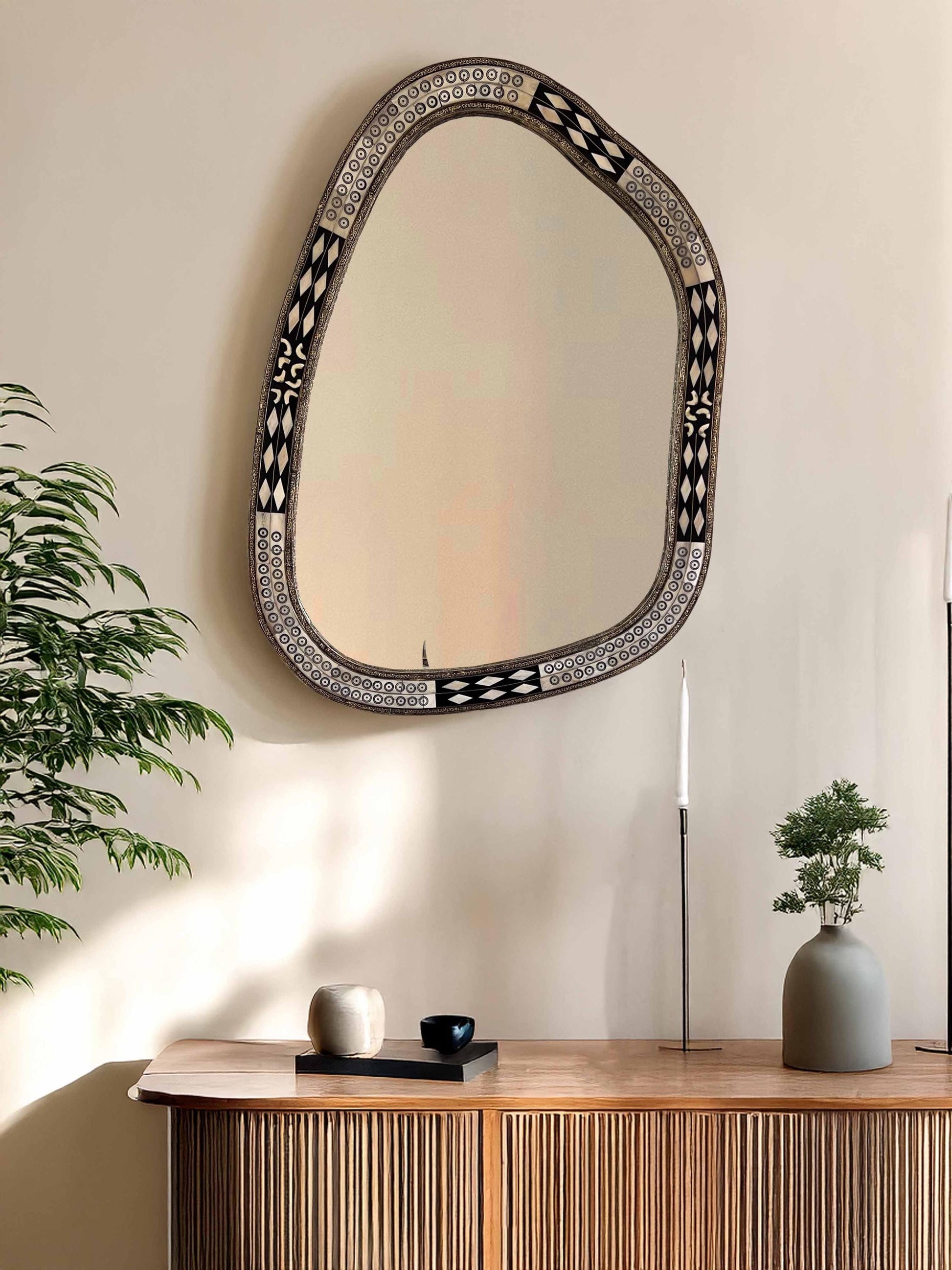 Asymmetrical Mirror above living room wood dresser