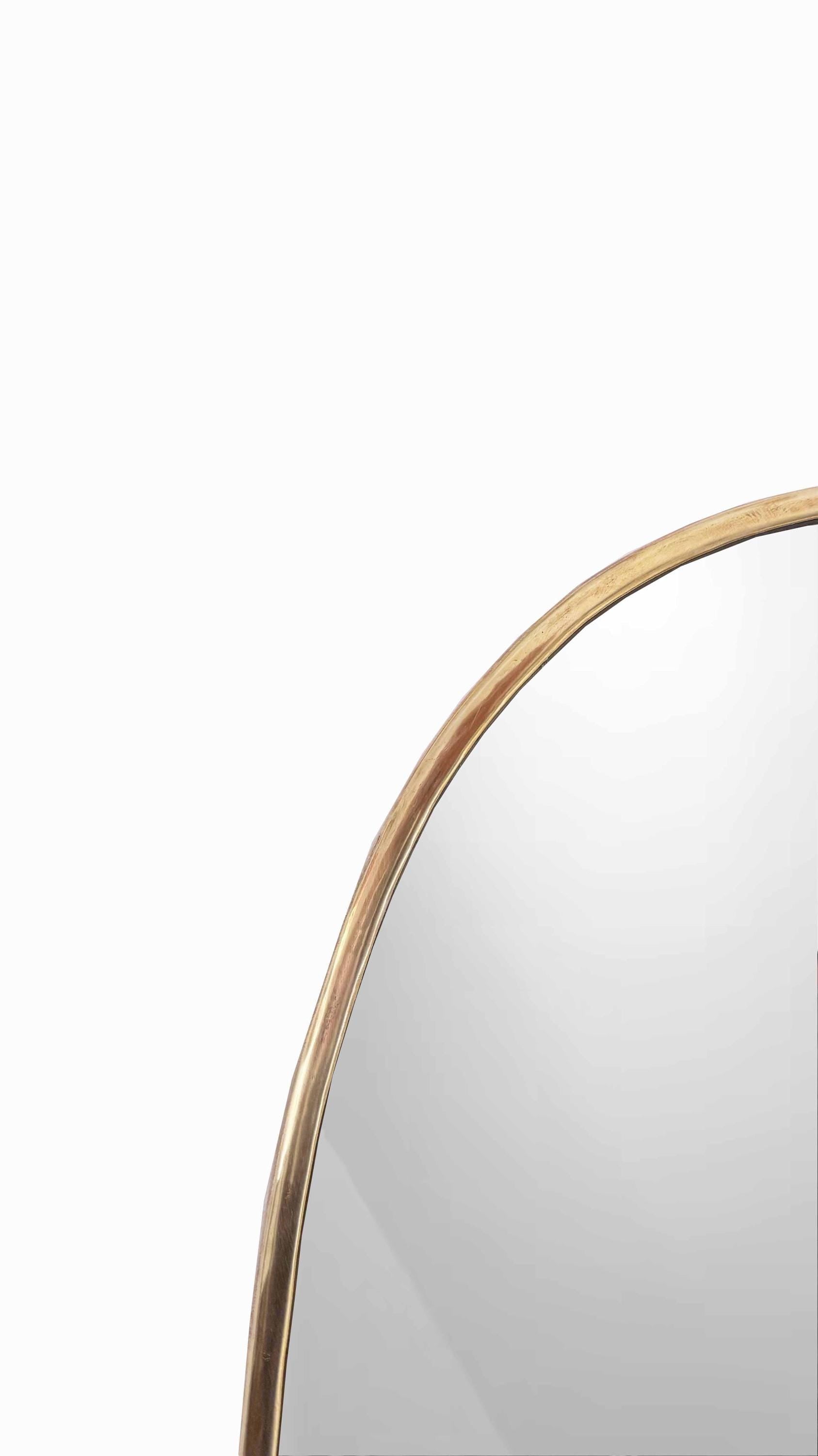 unlacquered brass frame mirror