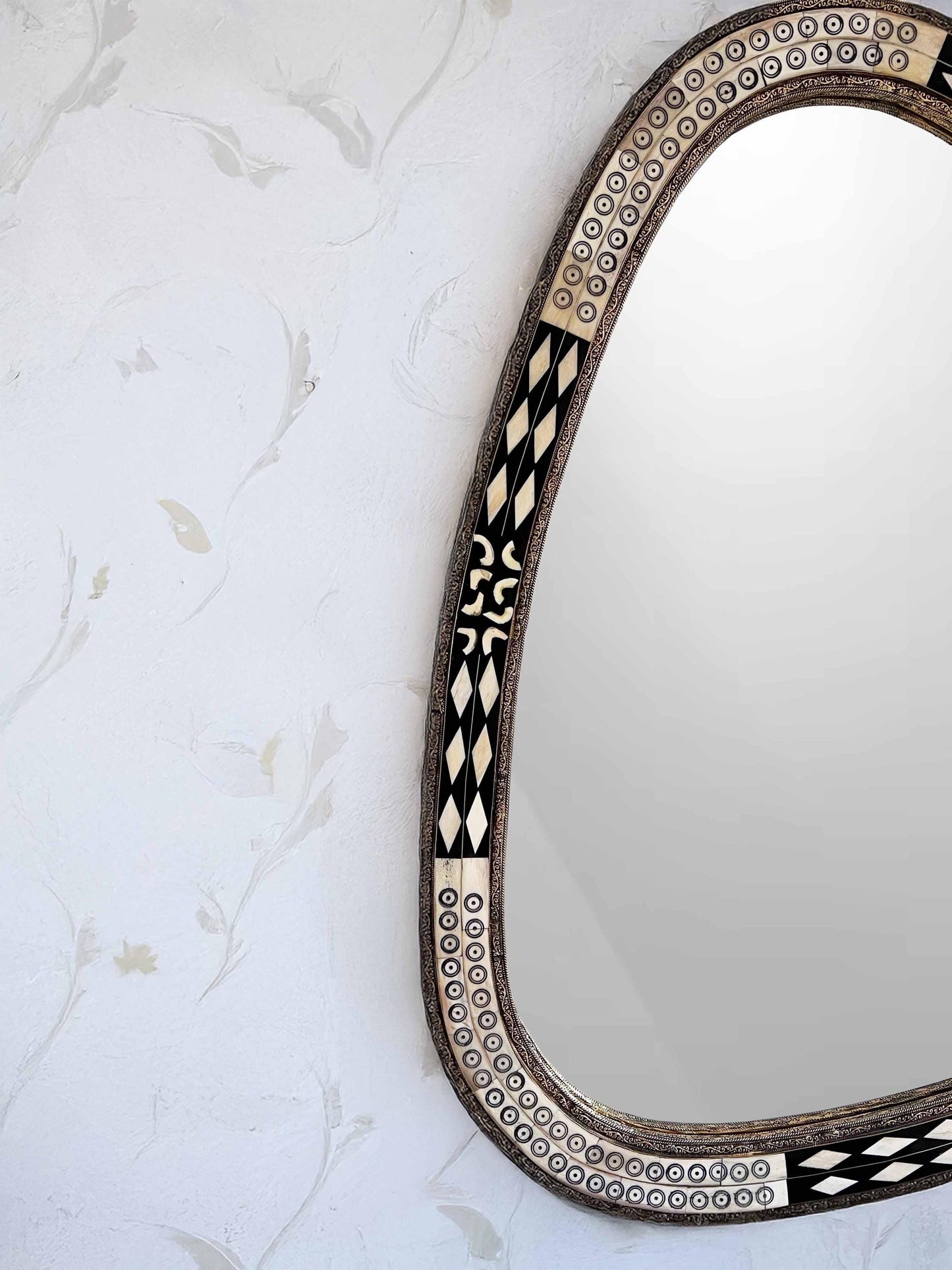 Asymmetrical bone frame Mirror