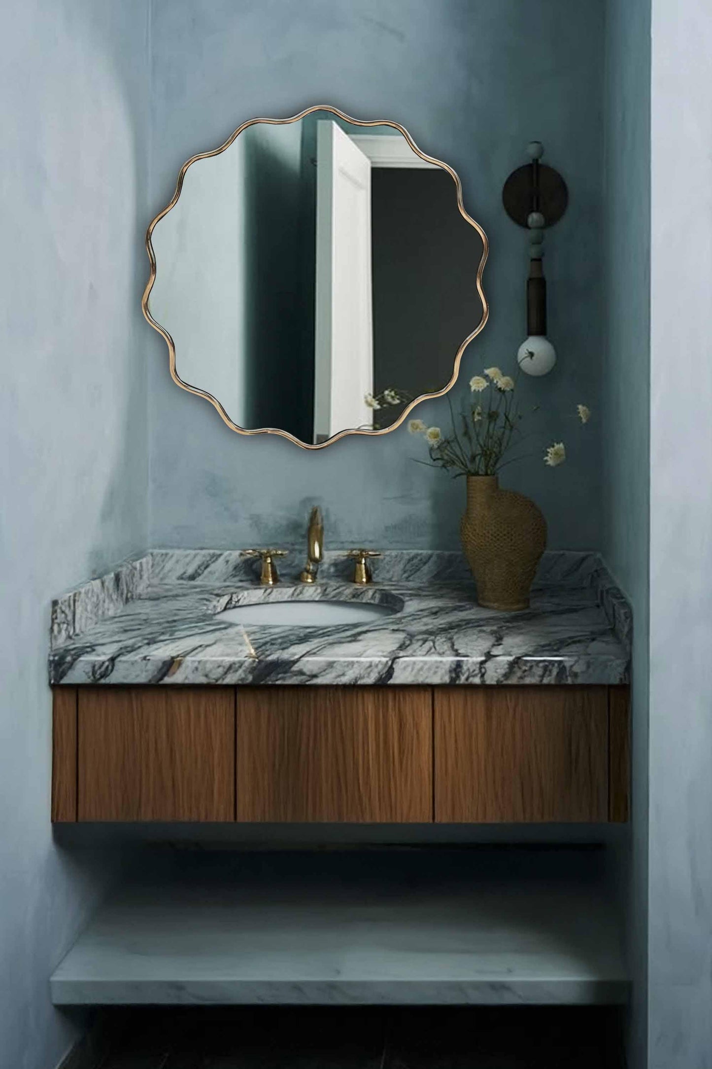 Wavy brass mirror in modern Bathroom