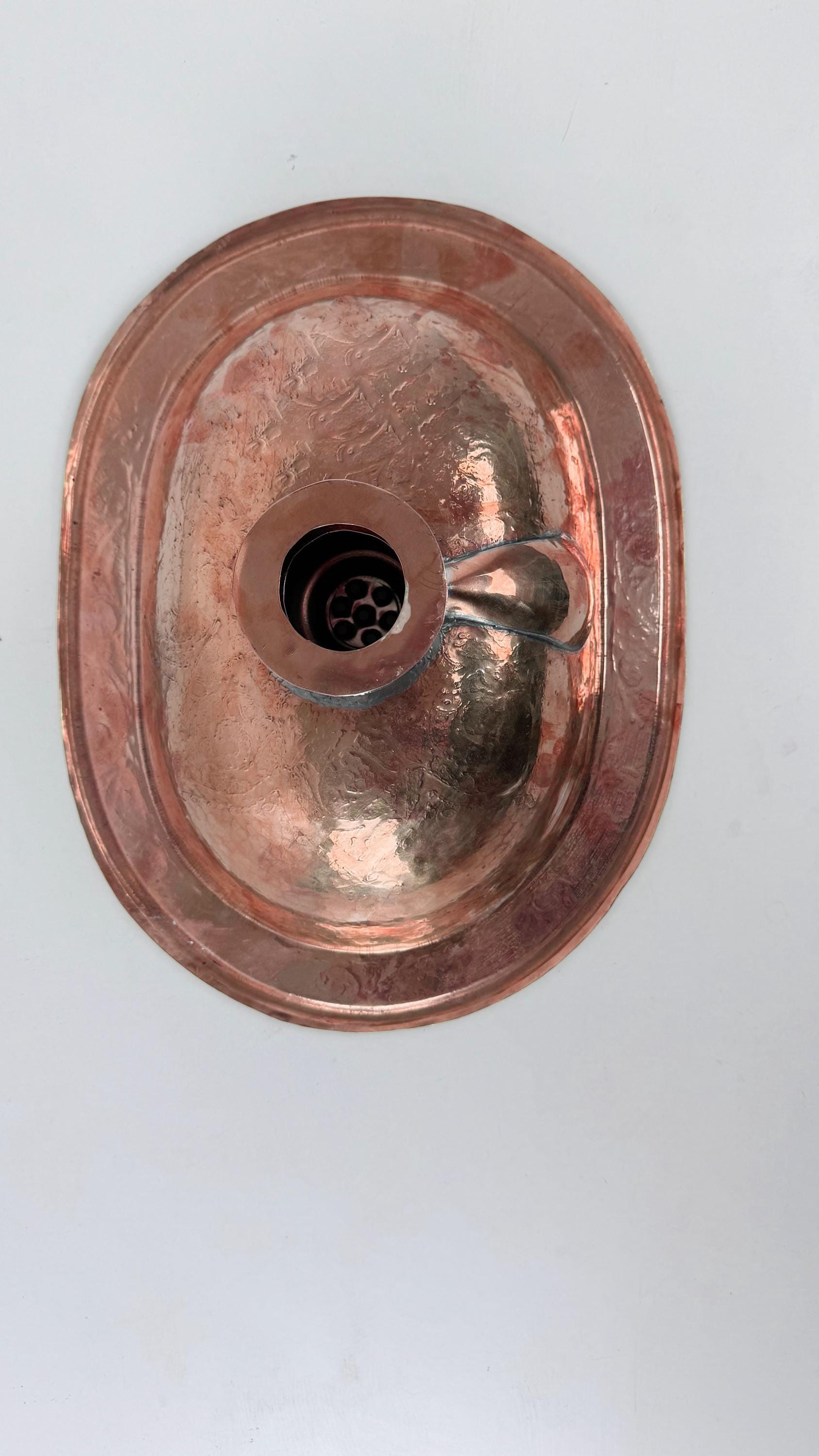 back of copper sink