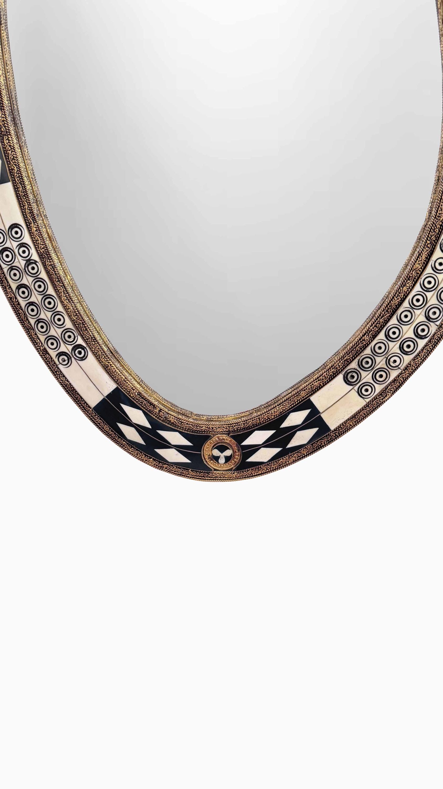 black frame bone and brass mirror