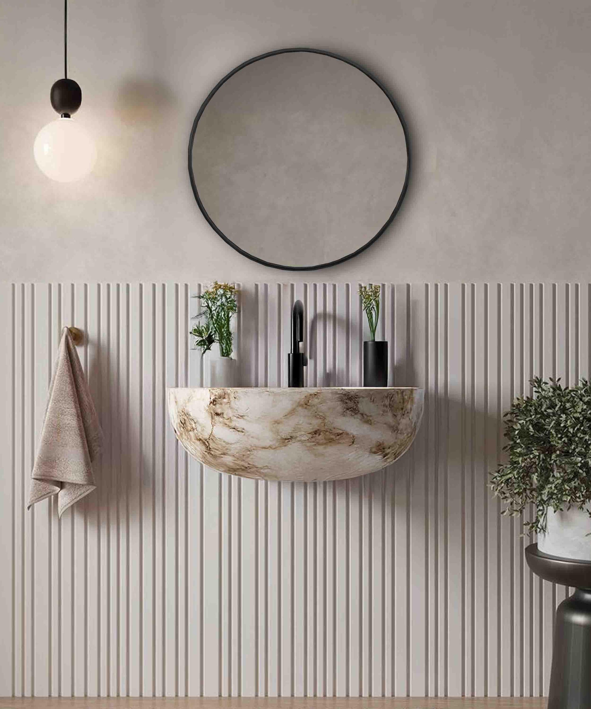 Black frame round mirror in bathroom