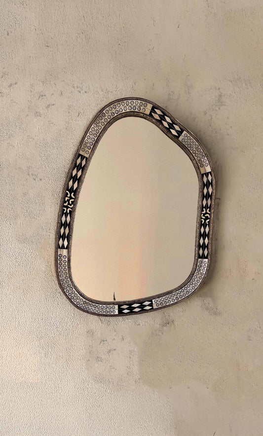 Asymmetrical Mirror