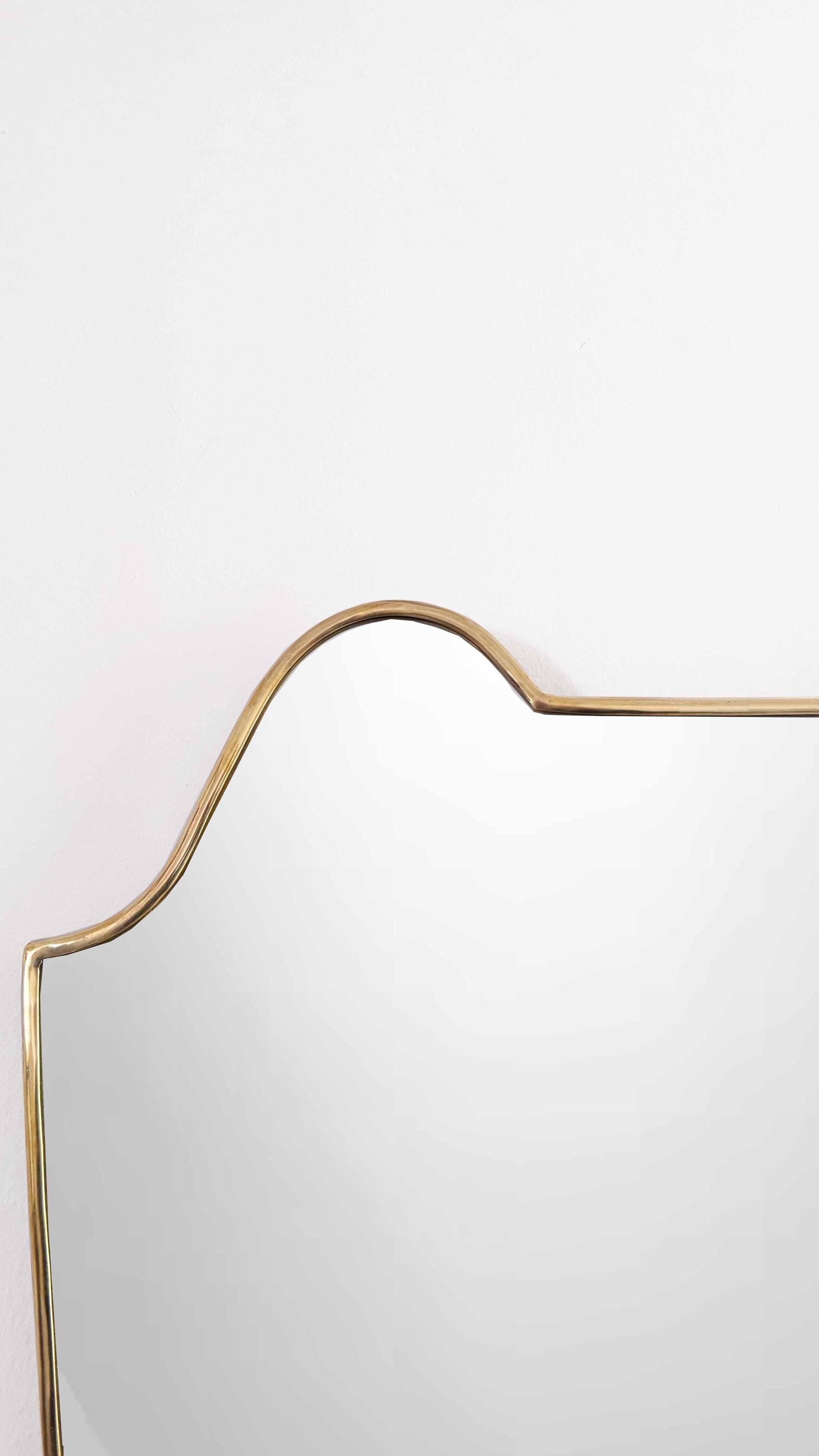unlacquered brass frame mirror