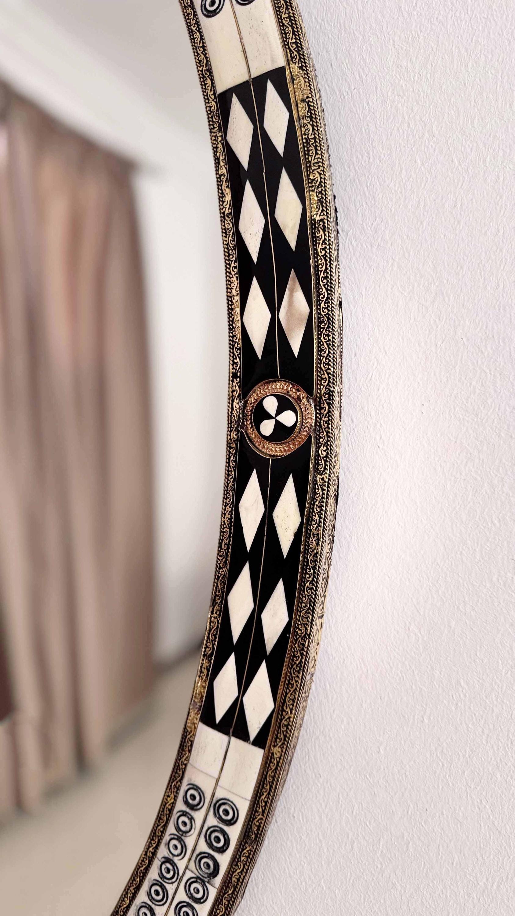 bone and brass frame mirror