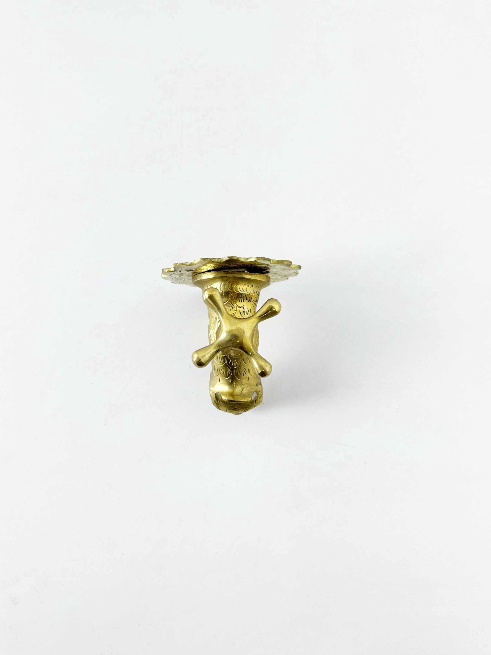 unlacquered brass faucet