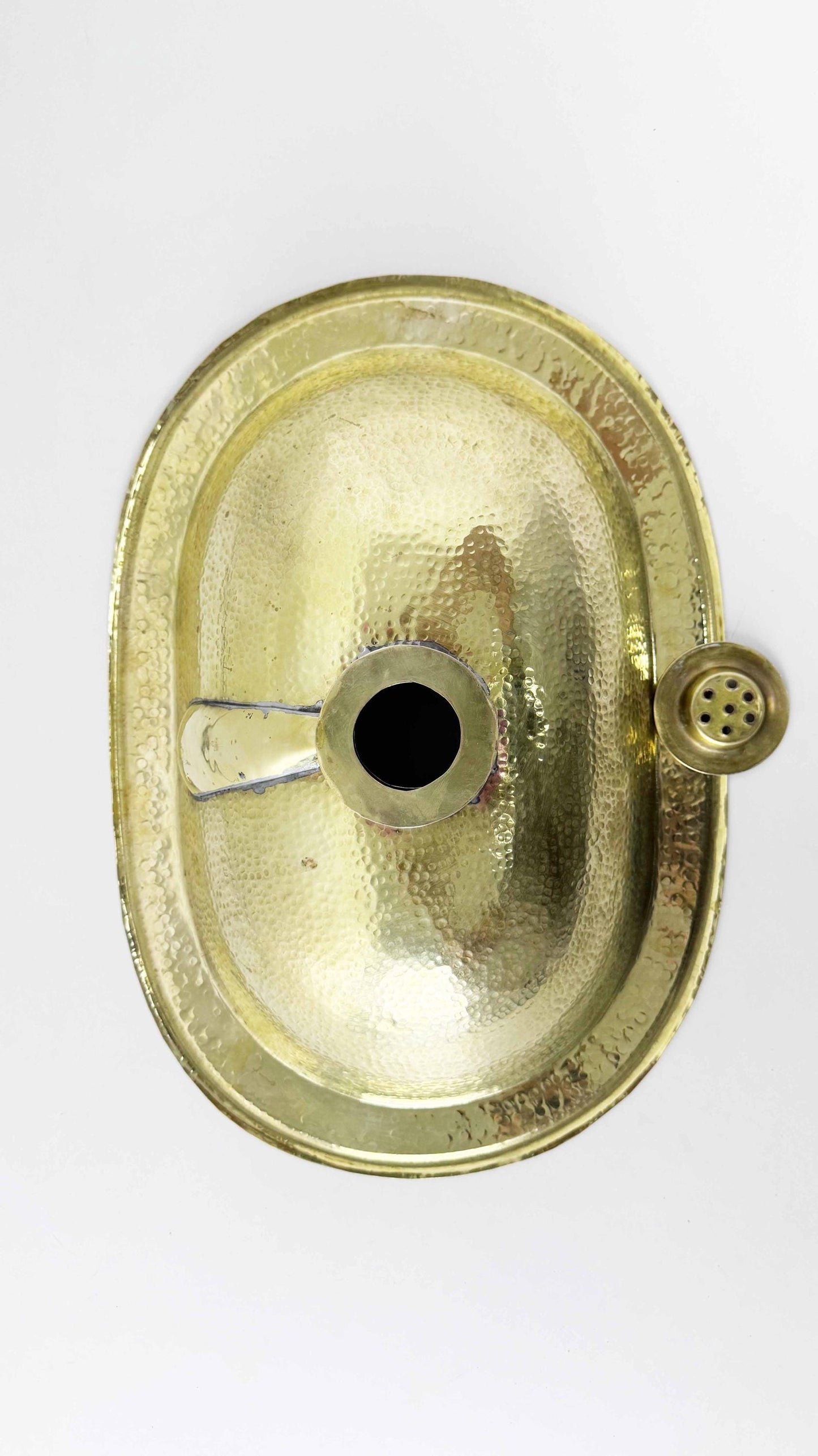back of hammered brass bathroom sink