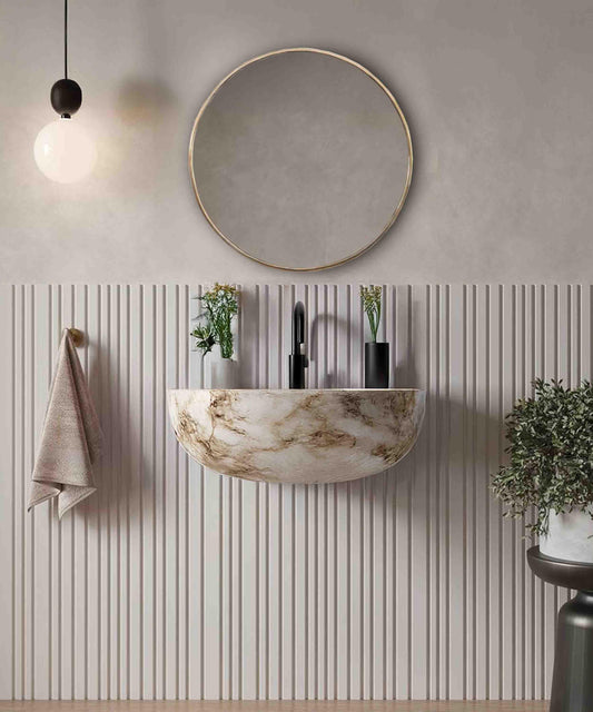 gold frame mirror in bathroom
