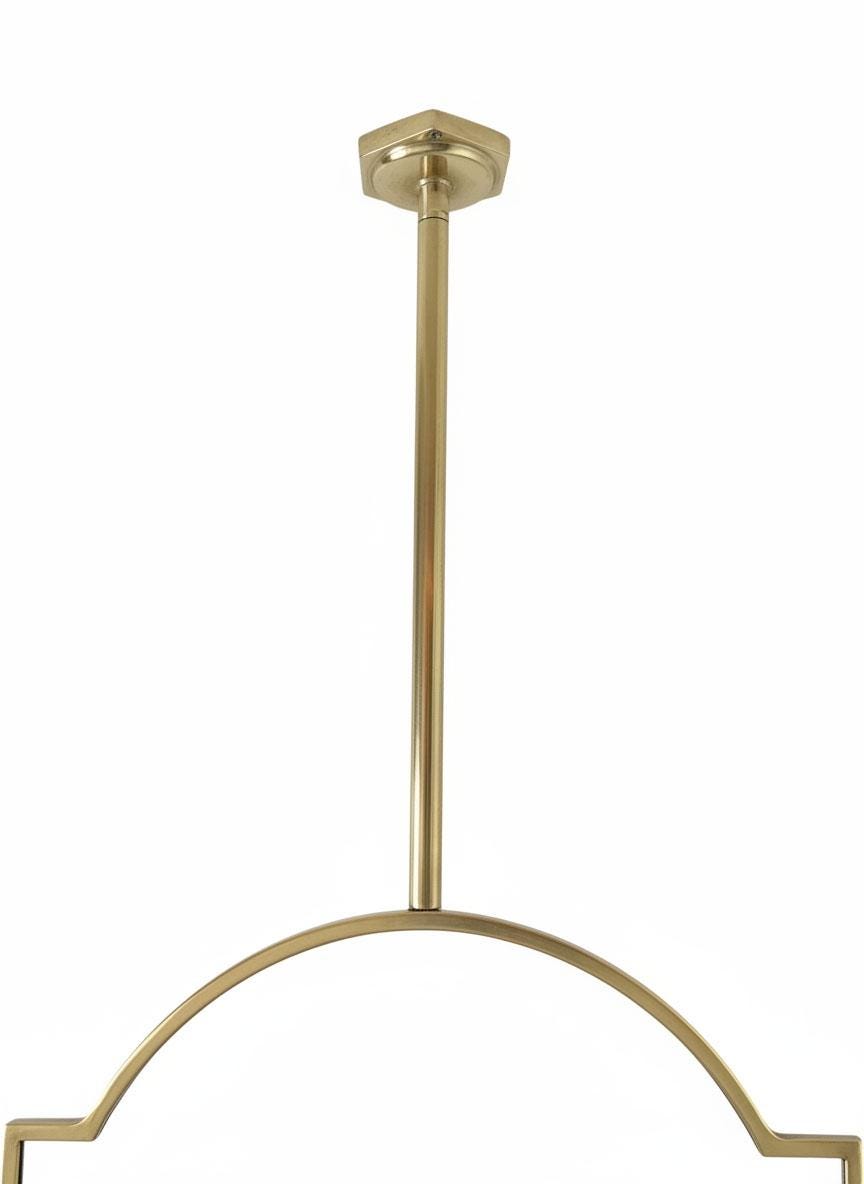 Brass ceiling rod detail for suspended mirror