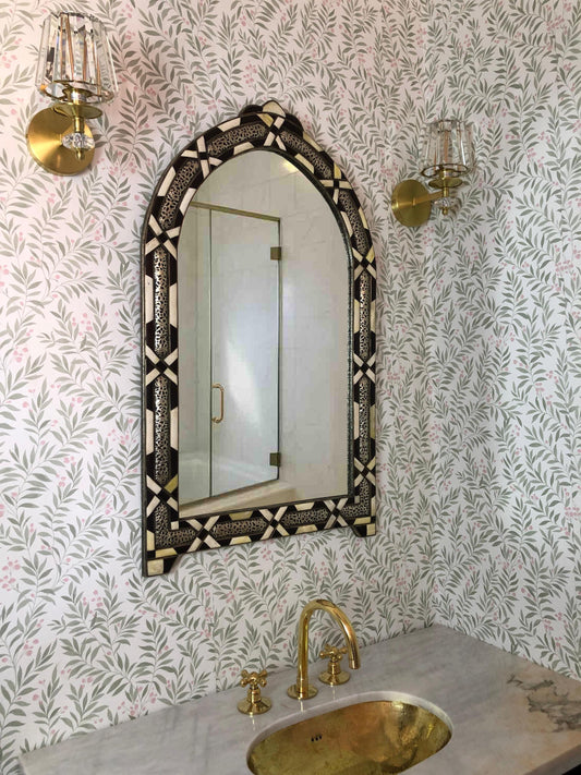 Bone inlay arch mirror over brass sink