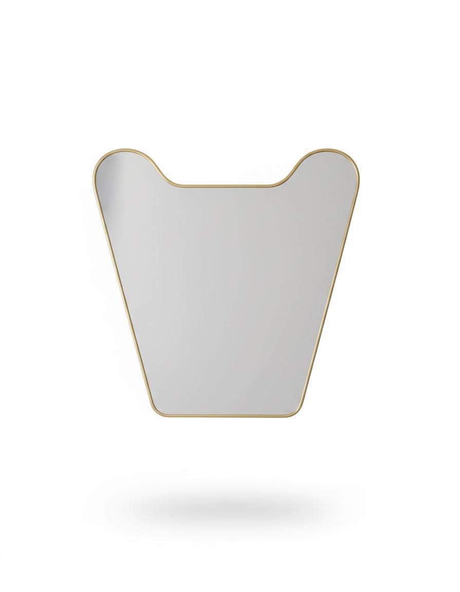 Organic brass vanity mirror inb a white background
