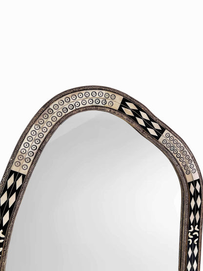 Asymmetrical bone frame Mirror in white background