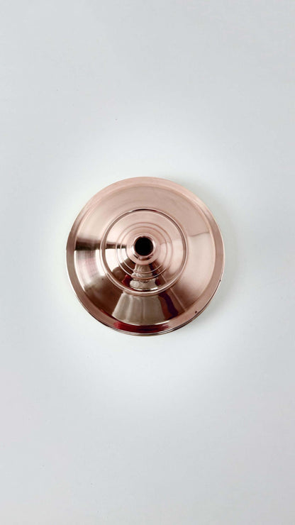 back of Copper Shower head in white background