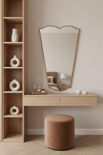Handmade tapered brass mirror over wooden vanity