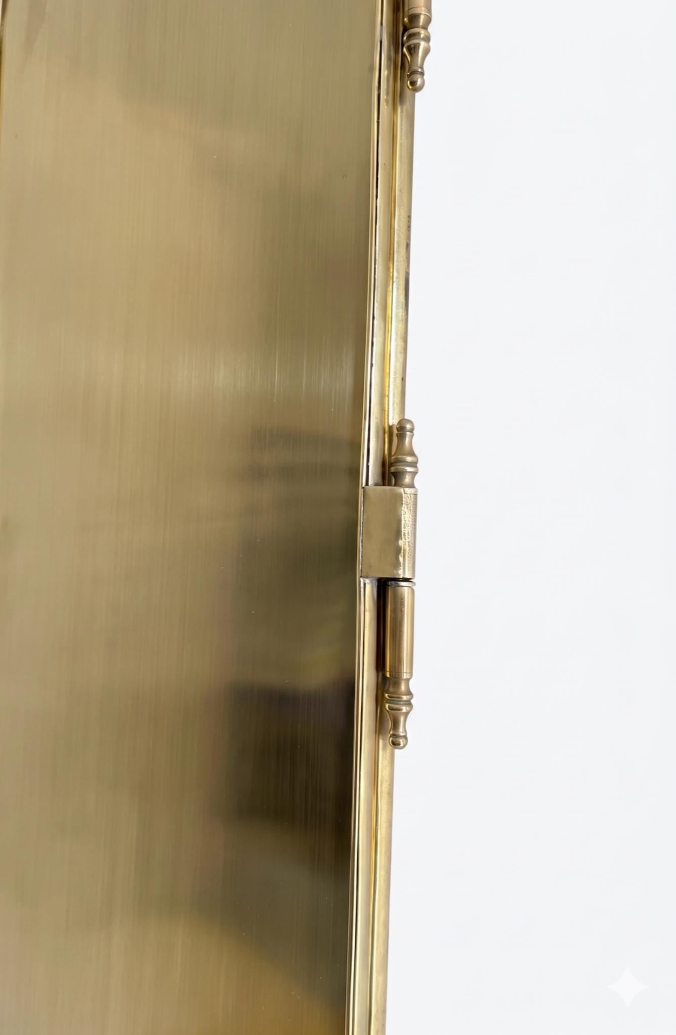 Close-up of brass hinge and back panel detail