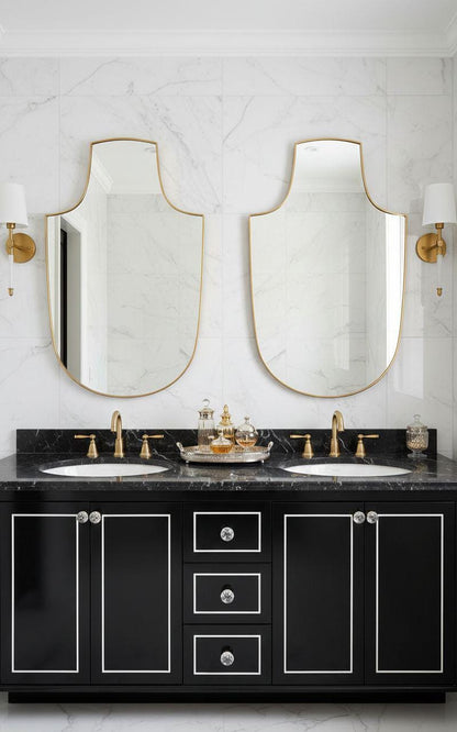 Double shield brass bathroom mirrors over black vanity