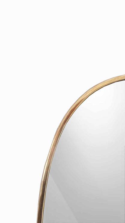 unlacquered brass frame mirror