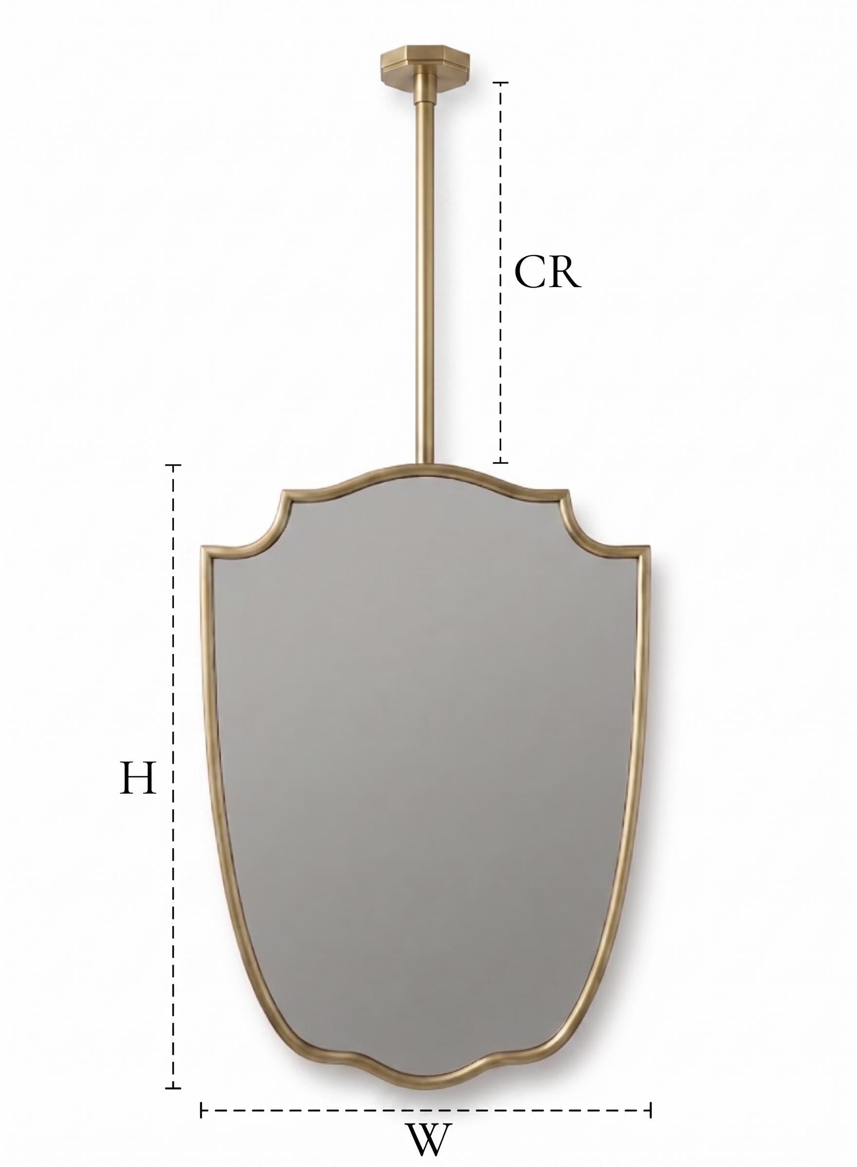 Suspended brass mirror with dimension guide showing height, width, and CR measurements.