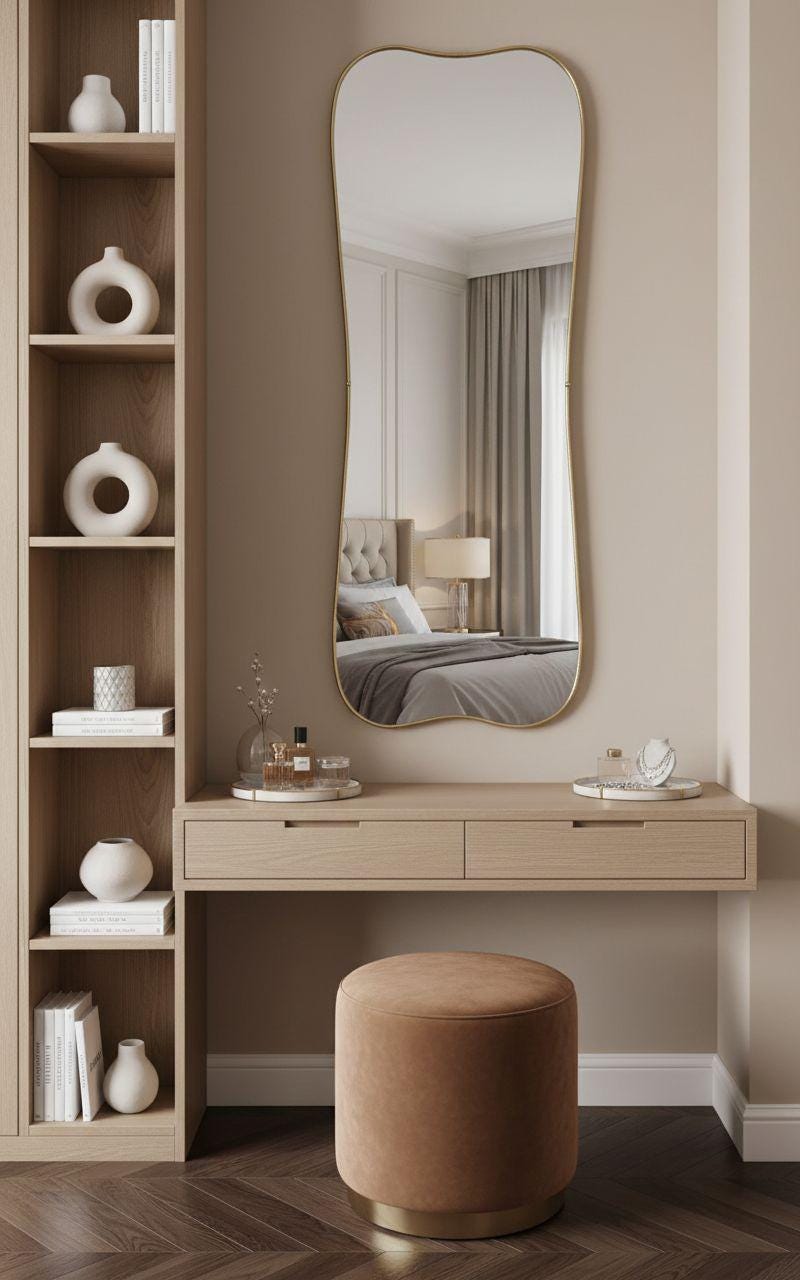 Wavy edge brass mirror in elegant bedroom vanity setup