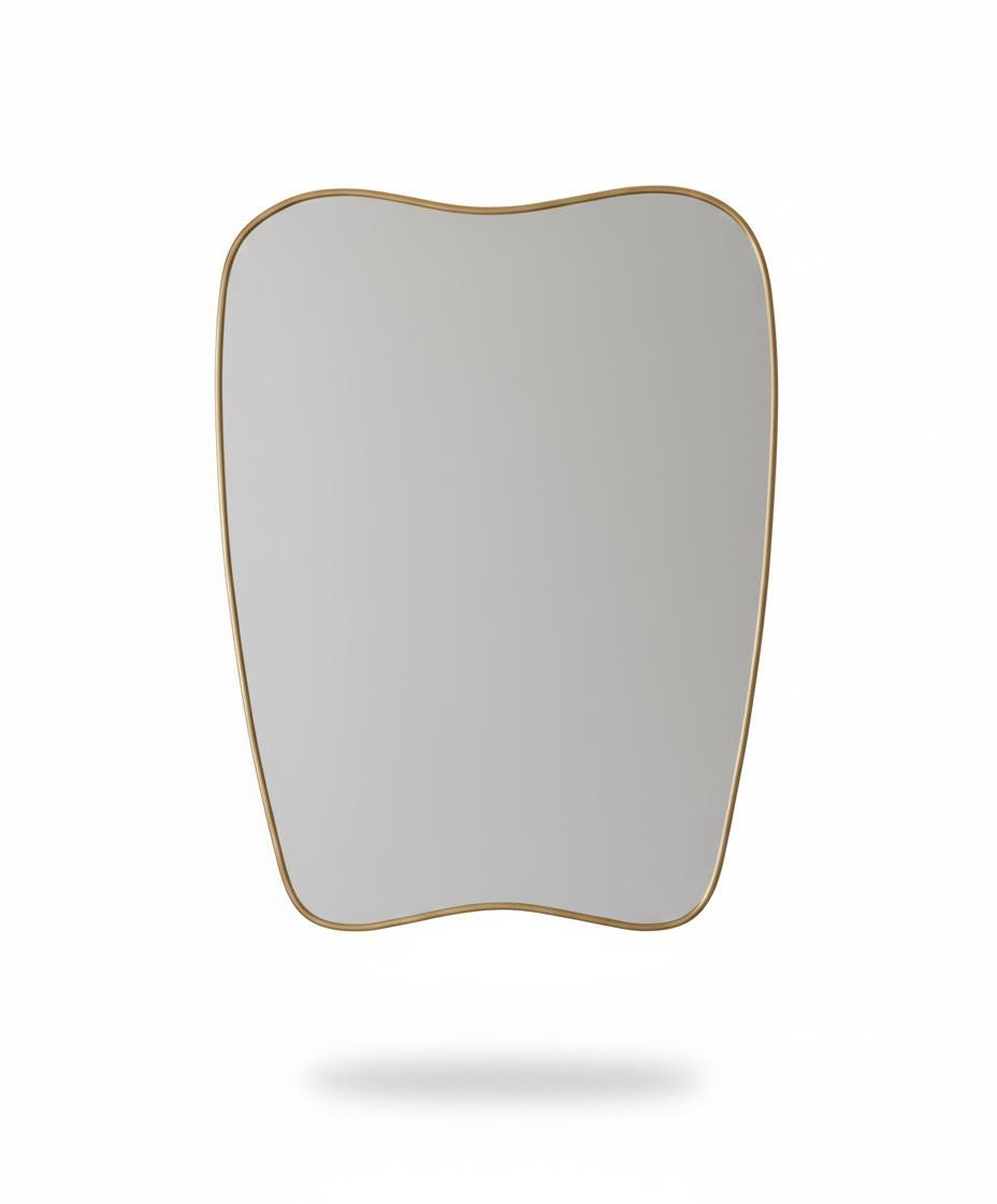 Soft curve brass mirror in a white background