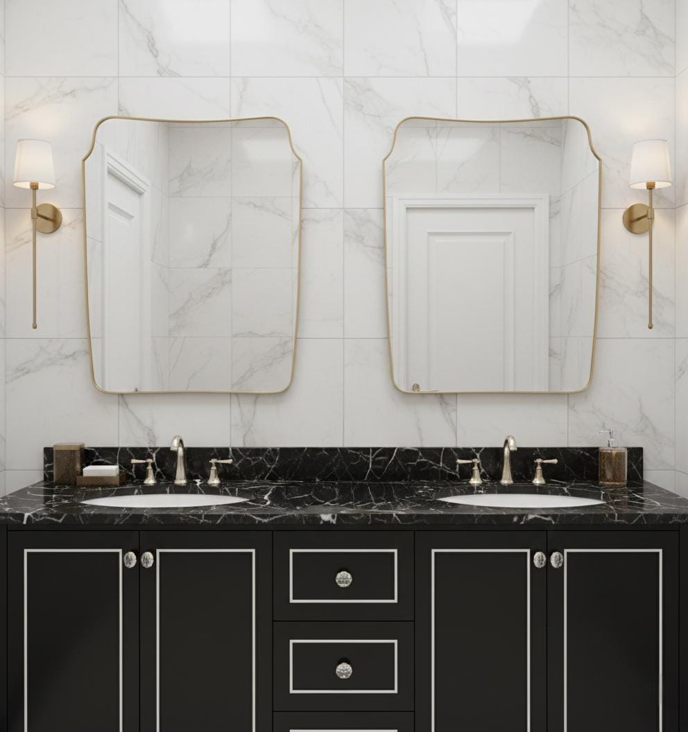 Irregular square brass mirror above double bathroom vanity