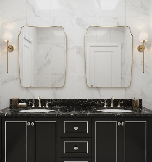 Irregular square brass mirror above double bathroom vanity