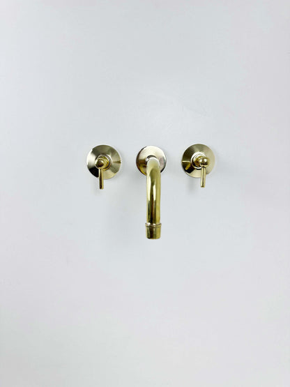 Unlacquered Brass Wall Mount Faucet on white background