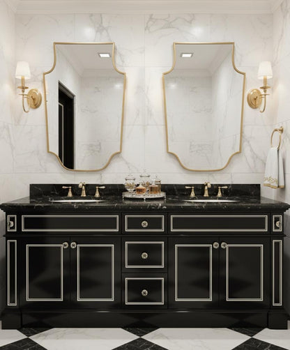 Pair of shield-shaped brass mirrors in double bathroom vanity