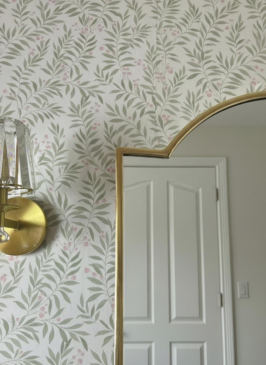 Brass mirror frame edge detail