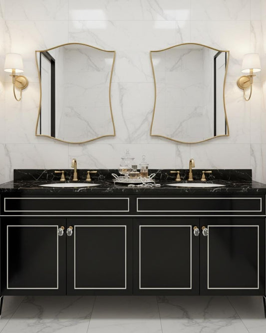 Pair of scalloped brass mirrors in luxury bathroom