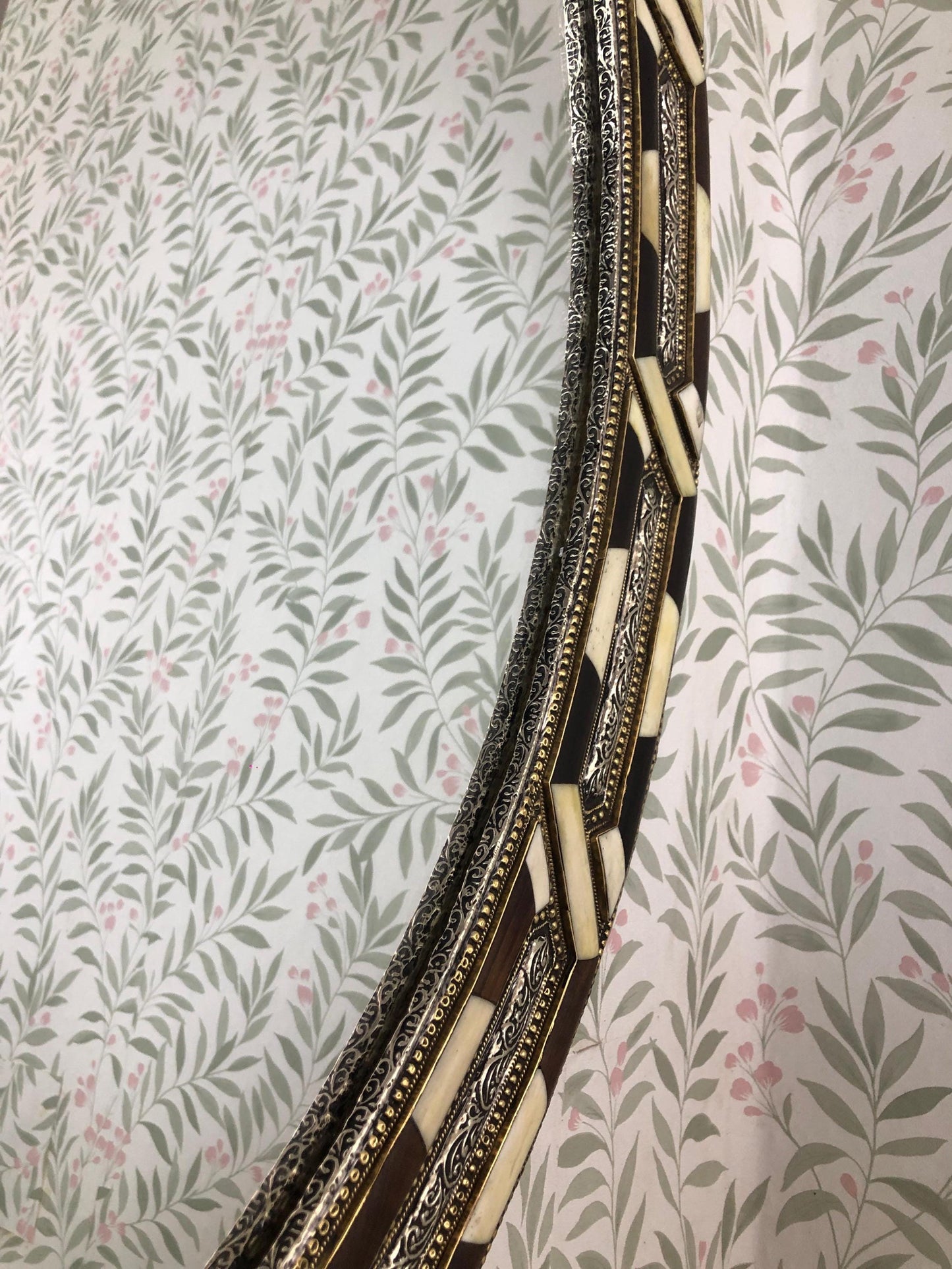 Close up photo of Circle Bone Inlay Mirror Frame