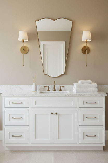 Tapered brass vanity mirror with wall sconces