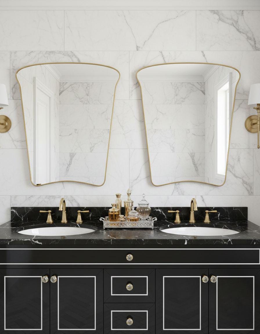Asymmetrical brass bathroom mirrors over double sink