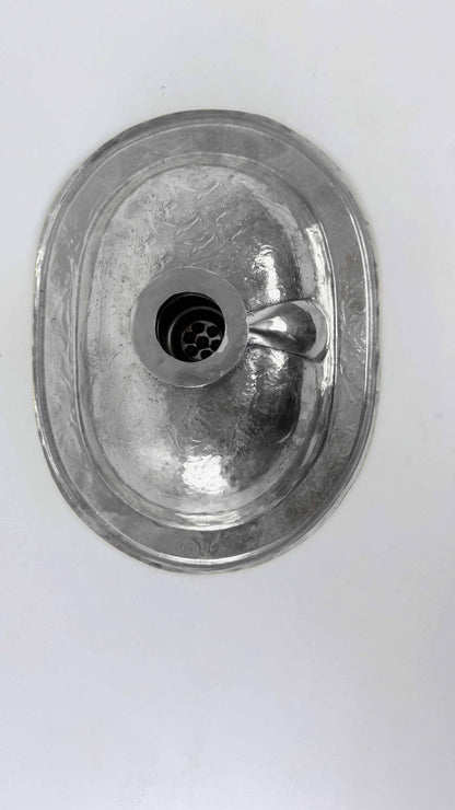 back of silver sink