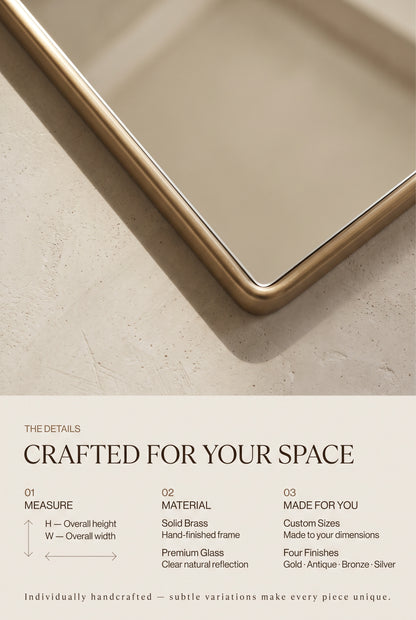 Close-up of a rounded brass mirror frame with height and width guidance, material details, and custom sizing options.