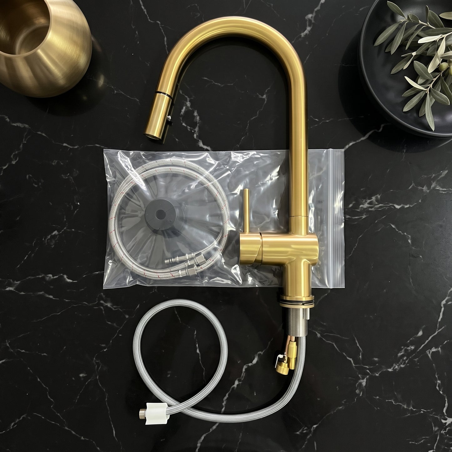 Solid brass pull-down kitchen faucet with installation parts
