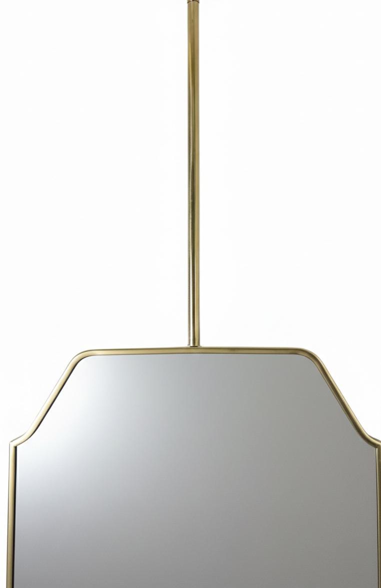 Ceiling rod detail of brass suspended mirror