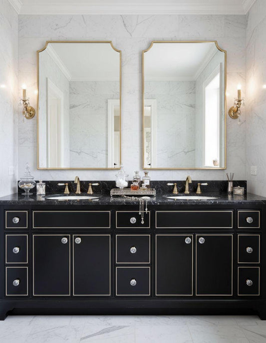 Scalloped brass bathroom mirror above double vanity