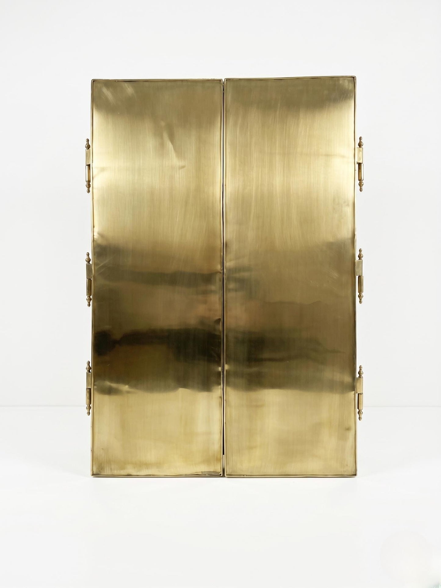 Solid brass back panels of foldable mirror