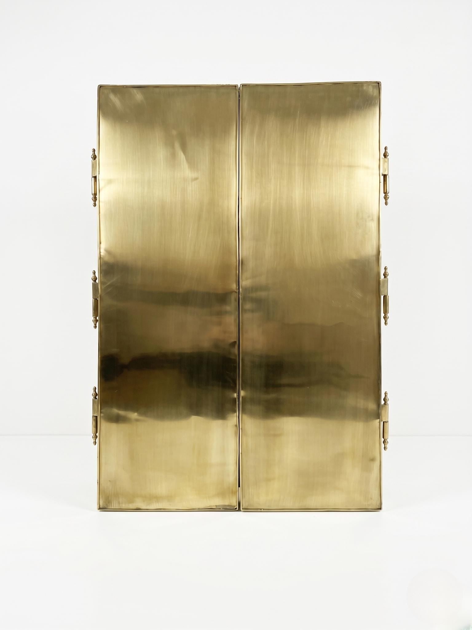 Solid brass back panels of foldable mirror