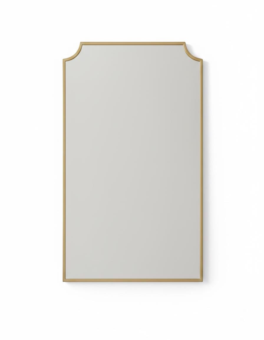 Scalloped brass mirror in a white background